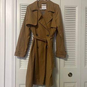 Tan raincoat with belt